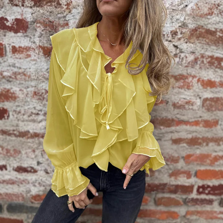 Ottilia Renzo™ Elegancka bluzka z falbanką