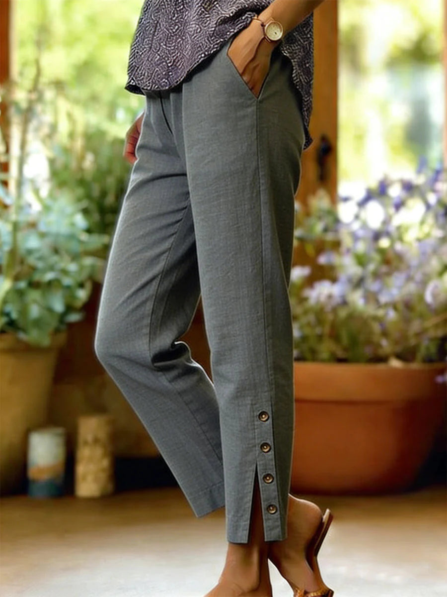 Clara Button Detail Ankle Trousers - side view highlighting tailored cut and ankle length