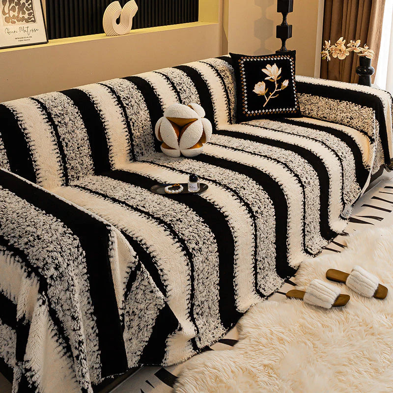 GripPlush Soft Grip Sofa Protector - sofa cover draped over couch armrest detail