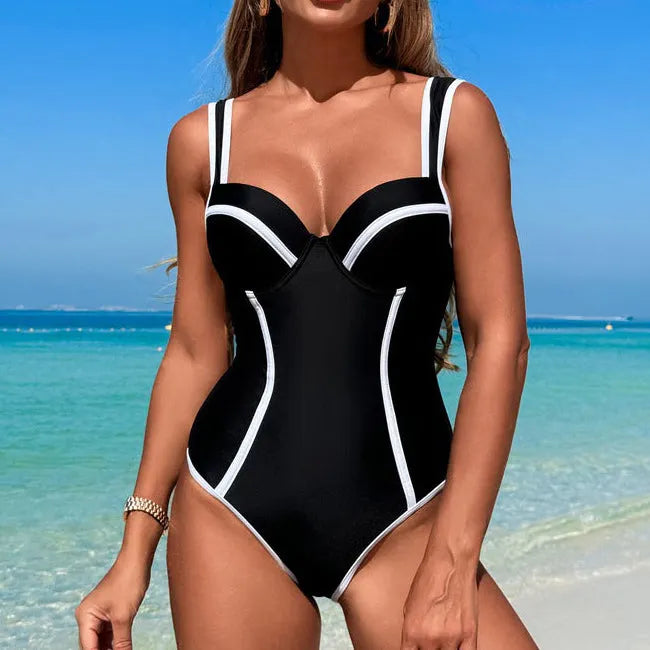 Slendella Slimming One-Piece Swimsuit - model wearing swimsuit at the beach