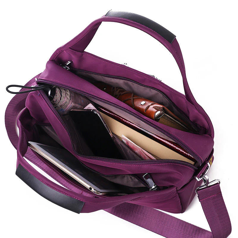 VaultChic Elegant Anti-Theft Tote Bag - back view with hidden anti-theft pocket
