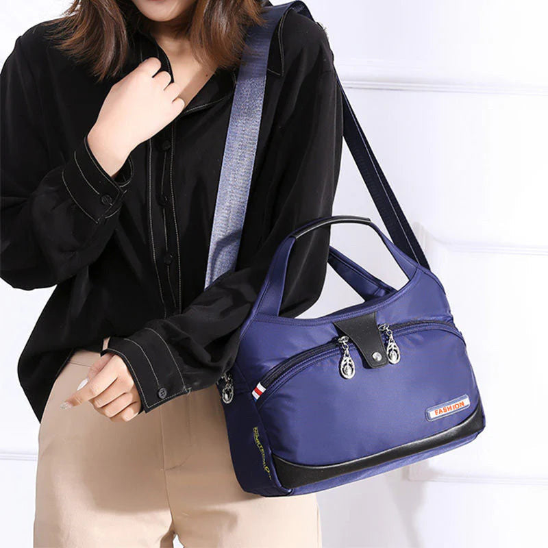 VaultChic Elegant Anti-Theft Tote Bag - lifestyle shot carried on shoulder by model