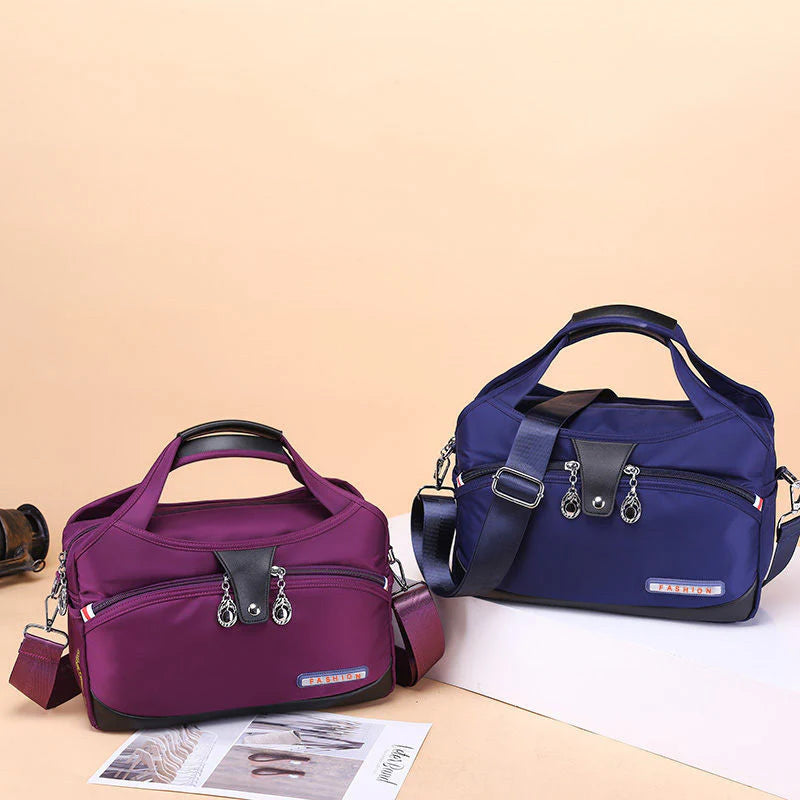 VaultChic Elegant Anti-Theft Tote Bag - lifestyle shot model accessing bag contents