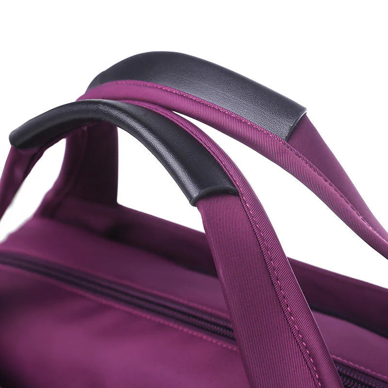 VaultChic Elegant Anti-Theft Tote Bag - bottom view showing sturdy feet and base