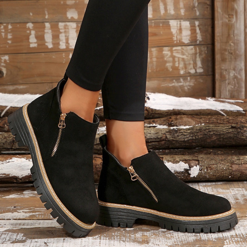 ZipStryde Sleek Zip Ankle Boots - close-up of zipper pull hardware and stitching