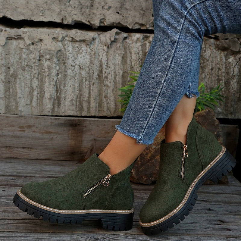 ZipStryde Sleek Zip Ankle Boots - lifestyle shot of women's ankle boots styled with jeans