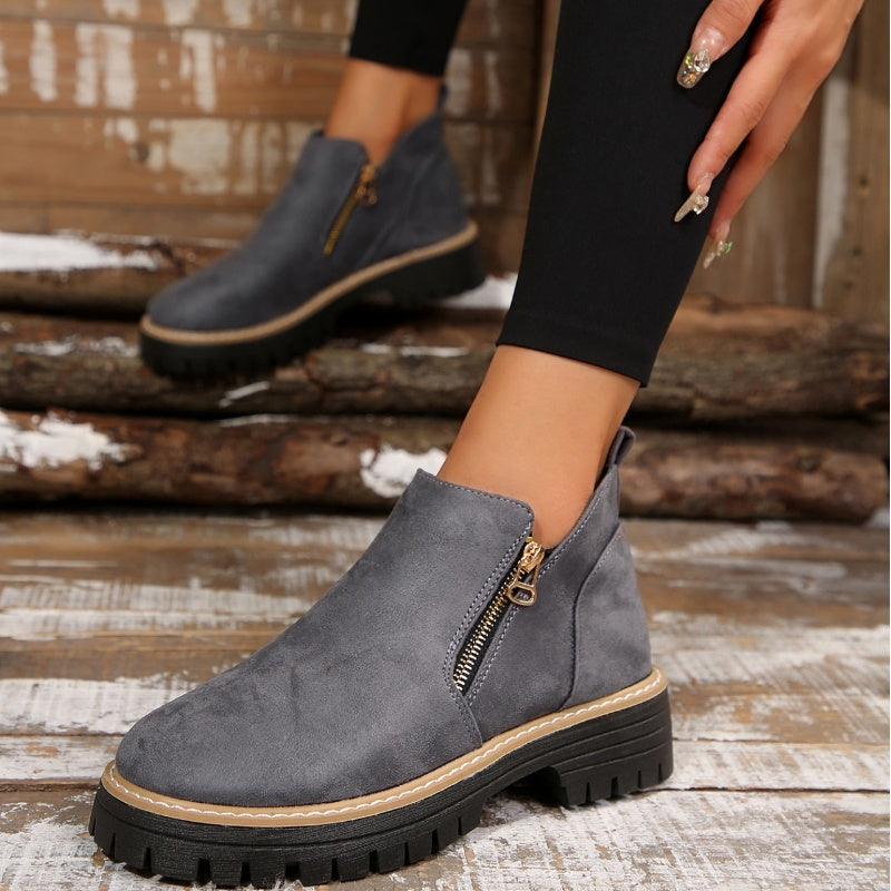 ZipStryde Sleek Zip Ankle Boots - styled ankle boots with feminine outfit on model